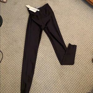 NWT Beyond Yoga reversible black/printed leggings